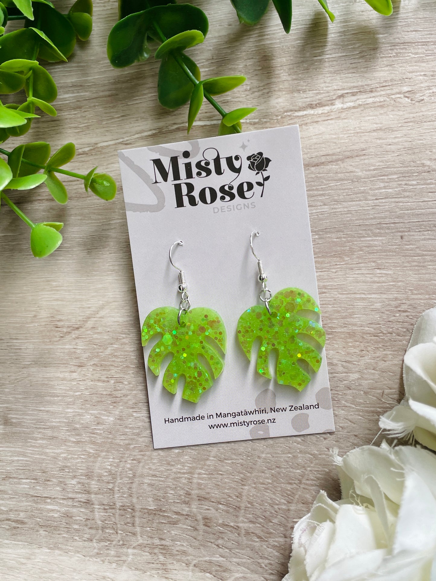 Monstera earrings 🌿🌿  Light green / lime green glitter mix  A welcome addition to our small/medium sized earring collection these are the same leafy style as our larger monsteras and sure to bring the jungle / tropical vibes to any outfit! 👌💚  Approx 3cm x 2.5cm