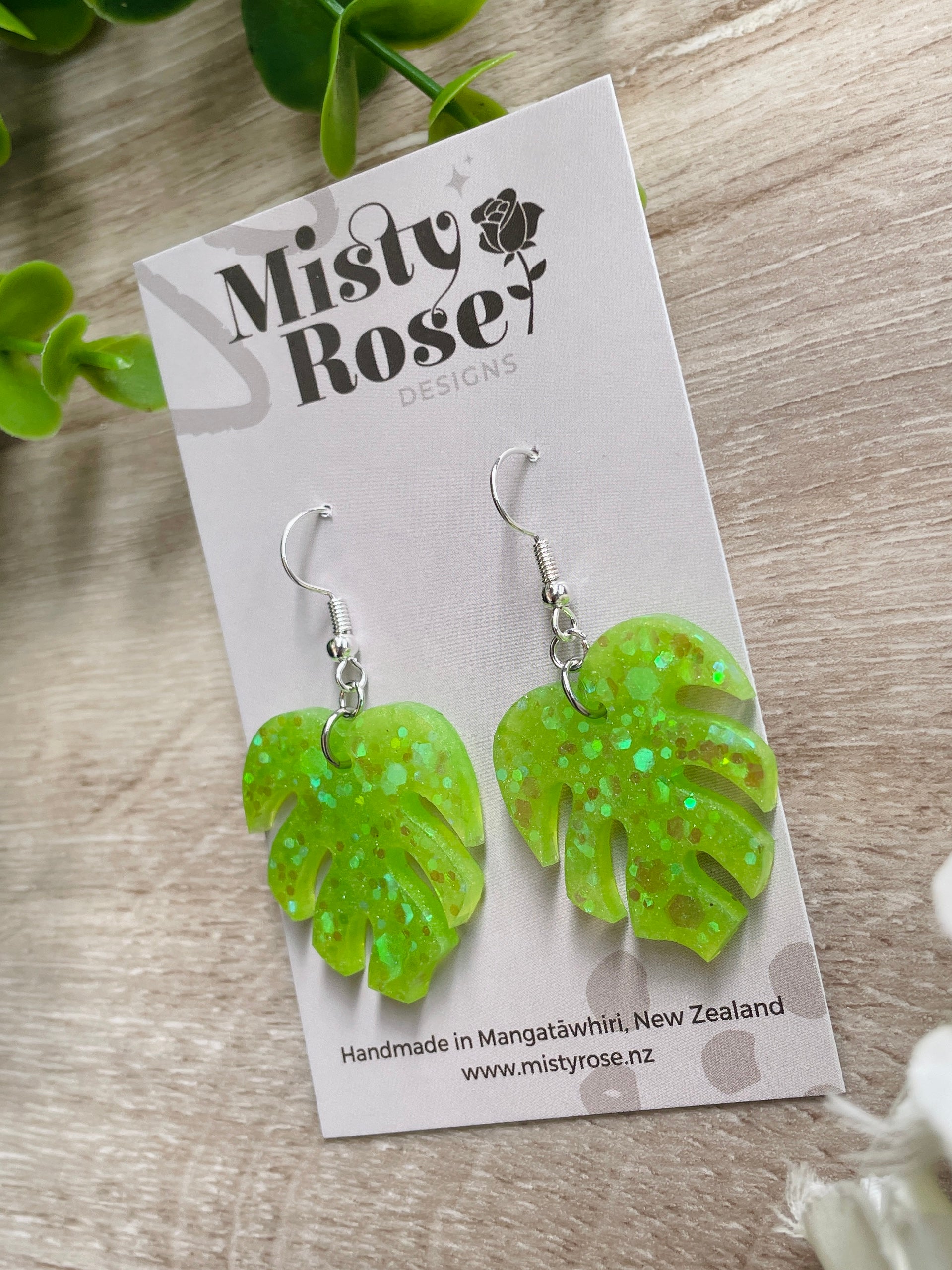 Monstera earrings 🌿🌿  Light green / lime green glitter mix  A welcome addition to our small/medium sized earring collection these are the same leafy style as our larger monsteras and sure to bring the jungle / tropical vibes to any outfit! 👌💚  Approx 3cm x 2.5cm