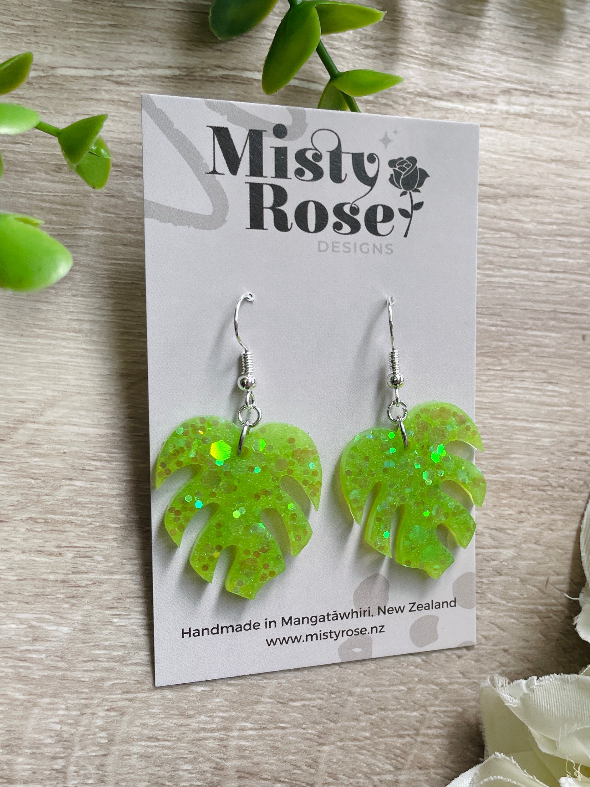 Monstera earrings 🌿🌿  Light green / lime green glitter mix  A welcome addition to our small/medium sized earring collection these are the same leafy style as our larger monsteras and sure to bring the jungle / tropical vibes to any outfit! 👌💚  Approx 3cm x 2.5cm