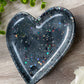 Heart trinket tray&nbsp;   Gorgeous black and grey tones with fabulous sparkle throughout 🖤🖤  Approx size&nbsp;120mm x 110mm (12cm x 11cm)  Rubber feet on bottom