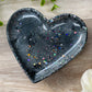 Heart trinket tray&nbsp;   Gorgeous black and grey tones with fabulous sparkle throughout 🖤🖤  Approx size&nbsp;120mm x 110mm (12cm x 11cm)  Rubber feet on bottom