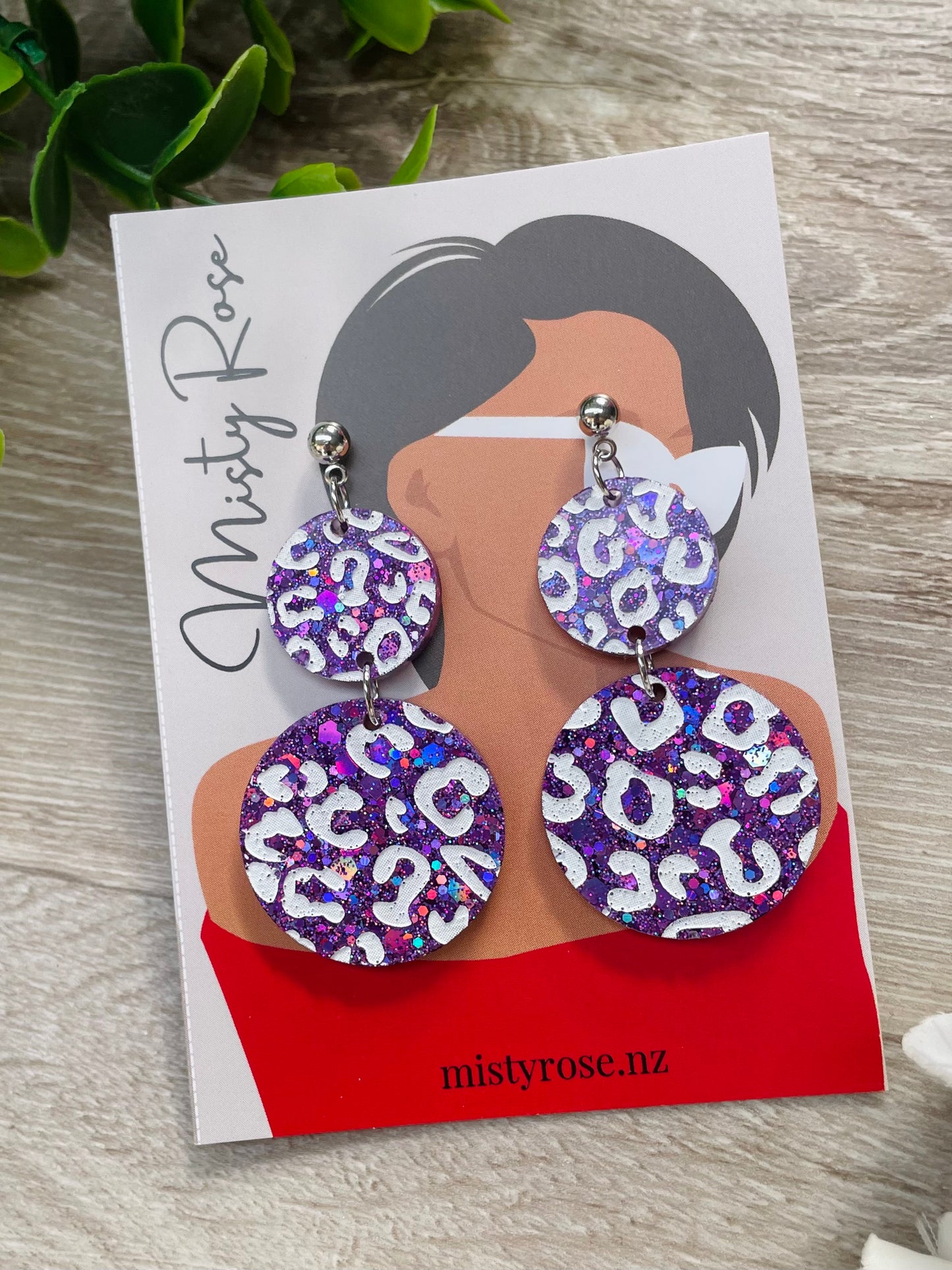 Leopard double circle earrings 🐆🐆  Gorgeous purple holographic glitter with white animal / leopard print detailing 💜  These fun, lightweight earrings are sure to add some sparkle to any look!  Approx 3cm wide x 5cm long with ball stud topper