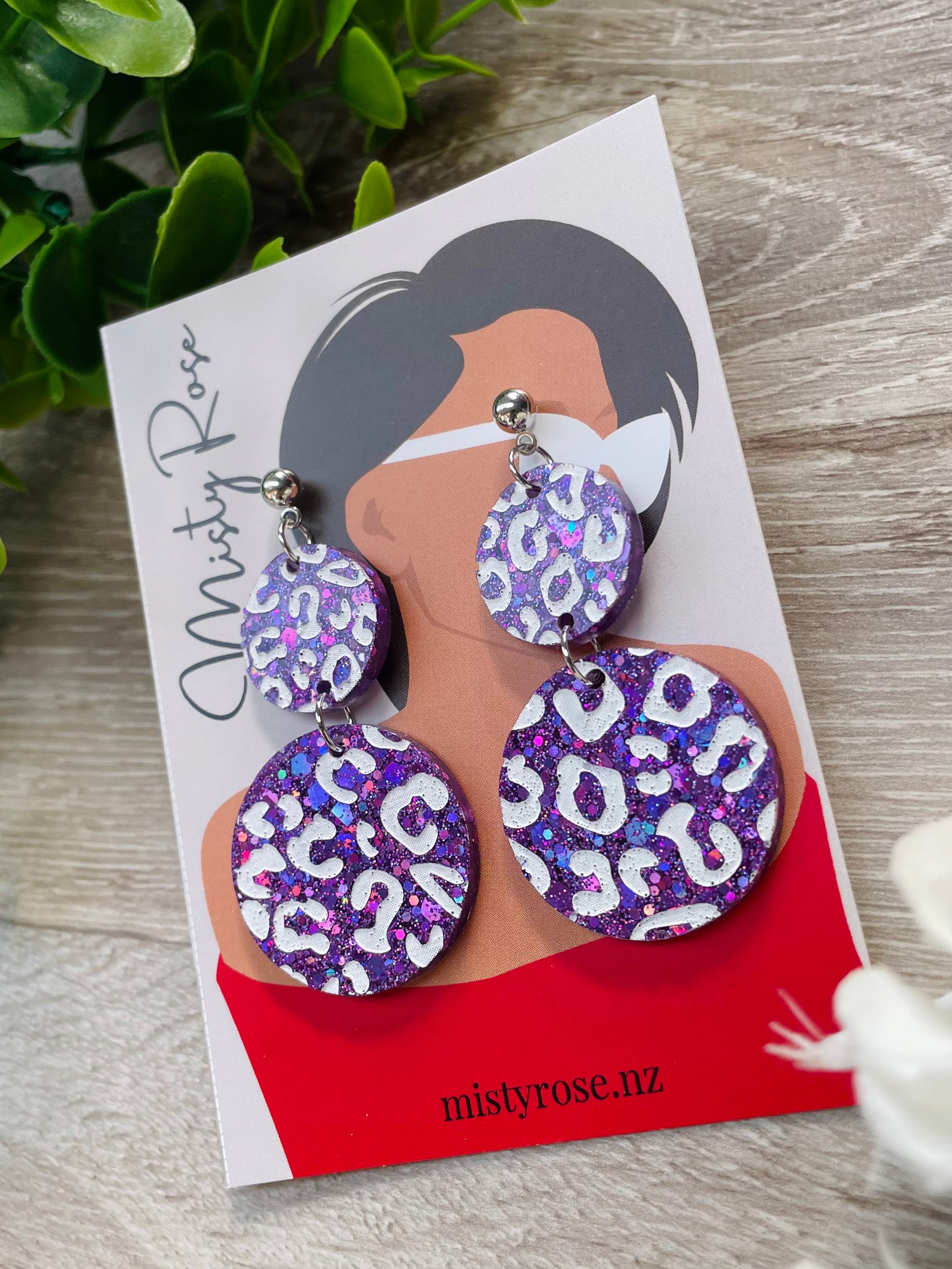 Leopard double circle earrings 🐆🐆  Gorgeous purple holographic glitter with white animal / leopard print detailing 💜  These fun, lightweight earrings are sure to add some sparkle to any look!  Approx 3cm wide x 5cm long with ball stud topper