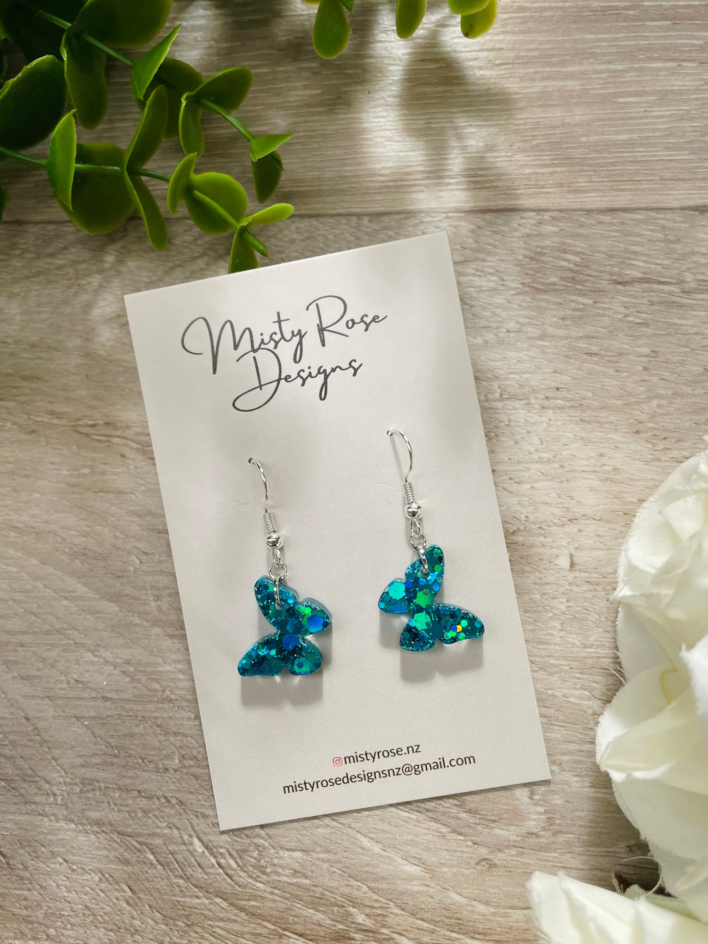 Mini Butterfly Earrings 🦋🦋  These are the most beautiful bright blue tone.  These cute & glittery lightweight earrings are sure to add some sparkle to any look!  Approx 1.7cm x 1.4cm
