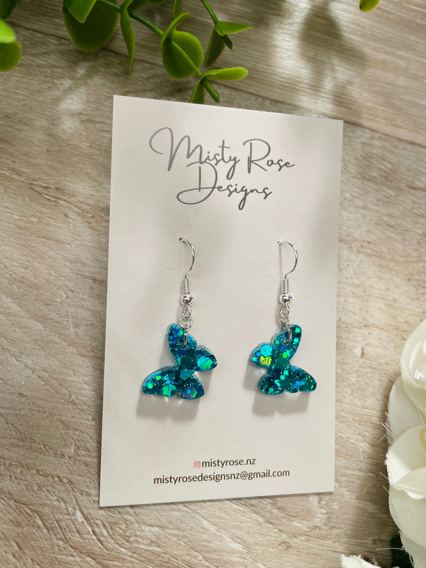 Mini Butterfly Earrings 🦋🦋  These are the most beautiful bright blue tone.  These cute & glittery lightweight earrings are sure to add some sparkle to any look!  Approx 1.7cm x 1.4cm
